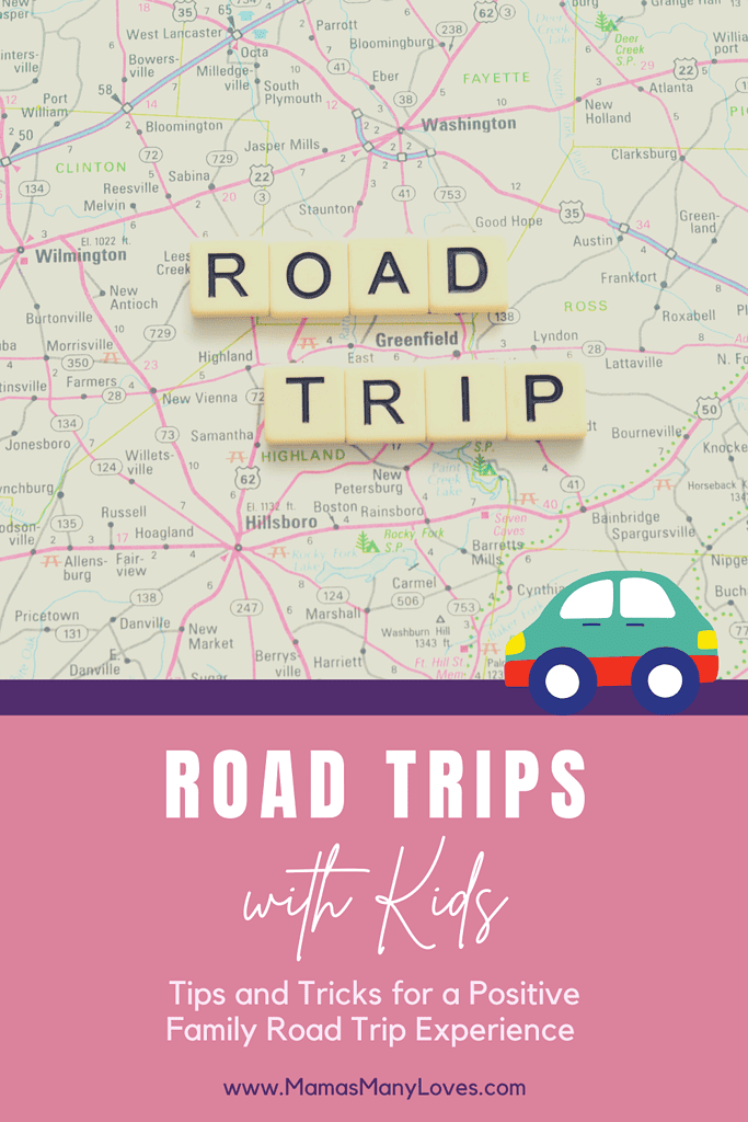 Map with Road Trip in scrabble letters. Text overlay: Road Trips with Kids