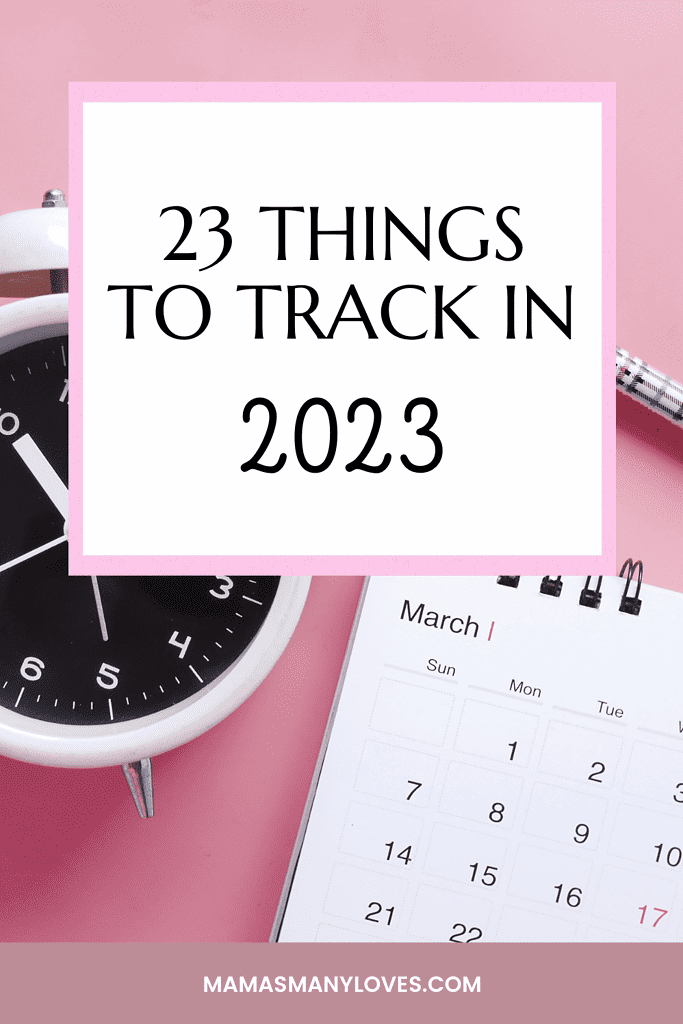 photo of an alarm clock and calendar on a pink background with text overlay "23 Things to Track in 2023"