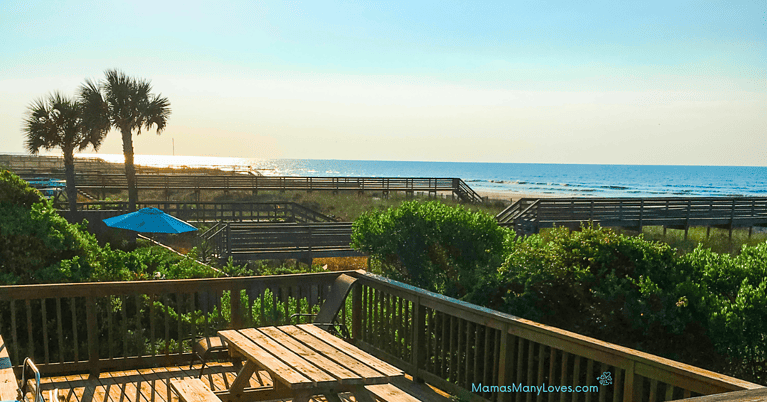Photo from the deck of a vacation rental home in Folly Beach, South Carolina looking at the ocean.