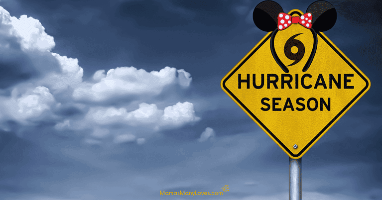 Dark clouds with yellow caution sign stating "Hurricane Season" with Minnie Mouse ears on top