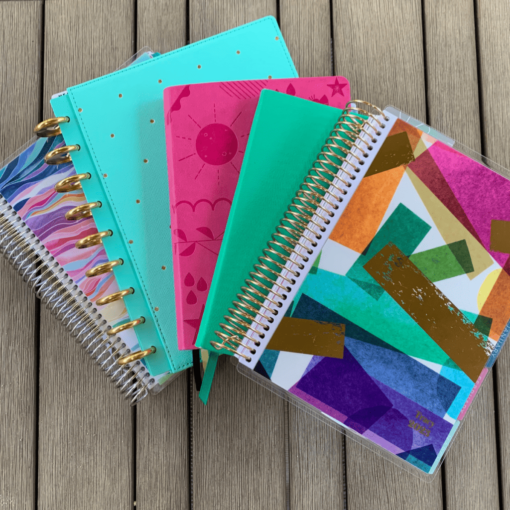 photo of Erin Condren planner alternatives including commit 30, happy planner and a bullet journal